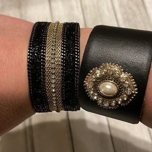Black and gold cuff bracelet set . Great condition